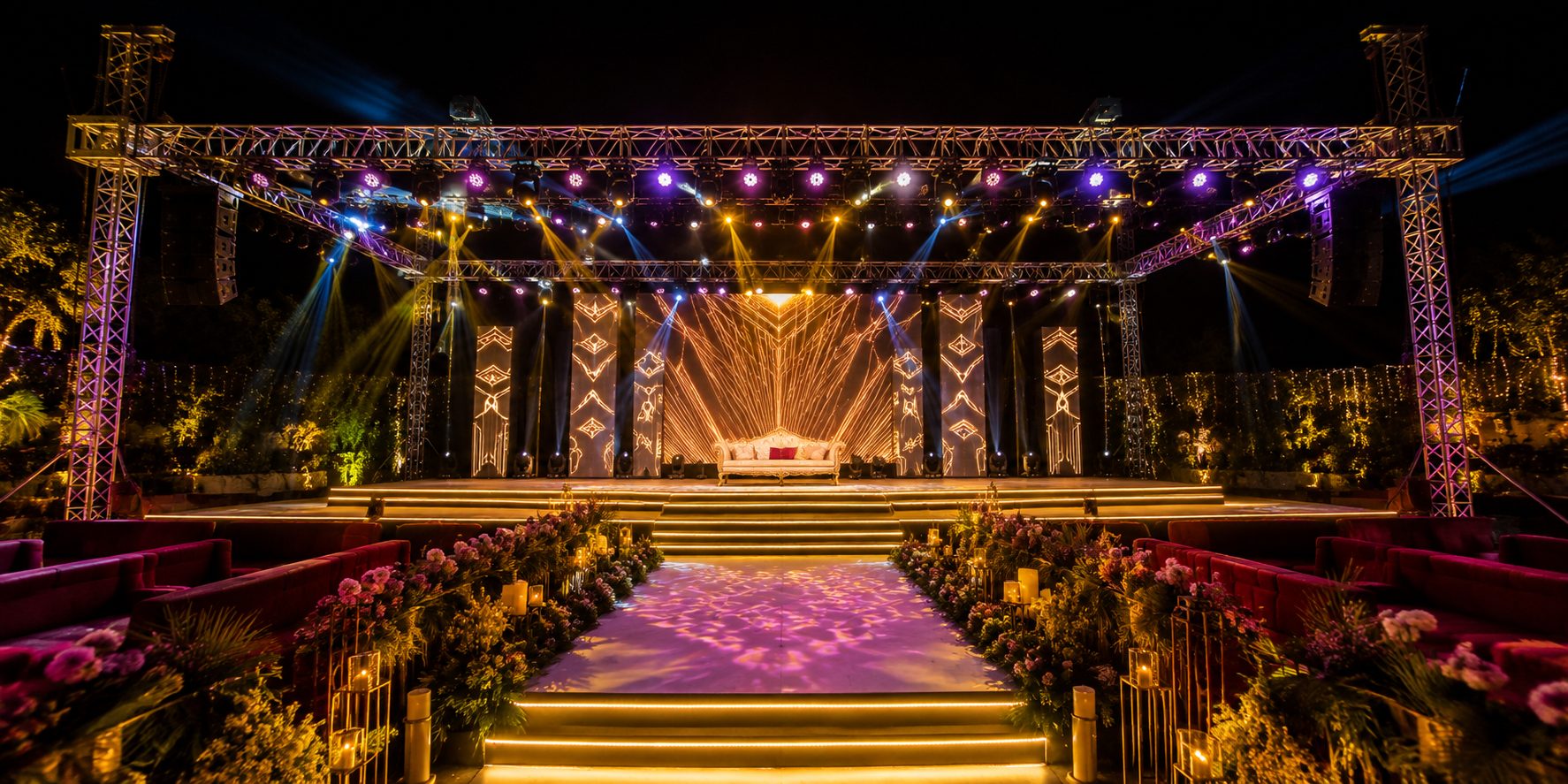 Sangeet night stage with LED backdrop and lighting in Ahmedabad